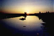 Восход солнца на соленом озере Эль-Джерид